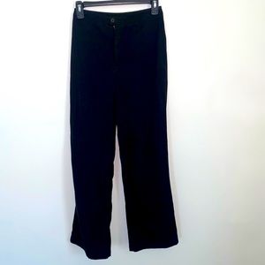 Fitted black slacks